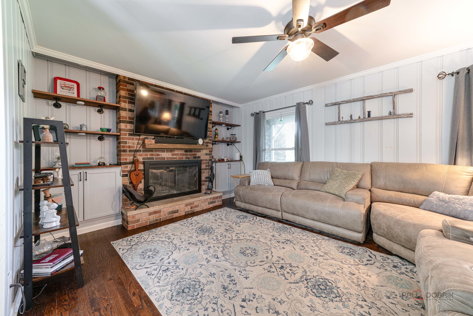 820 Black Partridge Road McHenry, IL 60051 - Photo 5 of 34 a living room with furniture and a flat screen tv