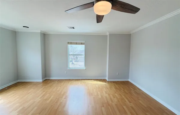 a view of a kitchen with a sink and wooden floor