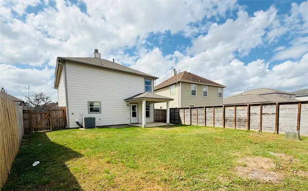 a house view with a garden space