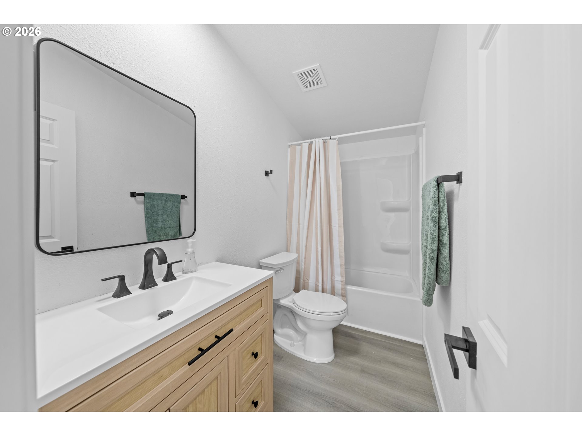 70 Darrell Avenue Winston, OR 97496 - Photo 25 of 39 a bathroom with a sink toilet a mirror and shower