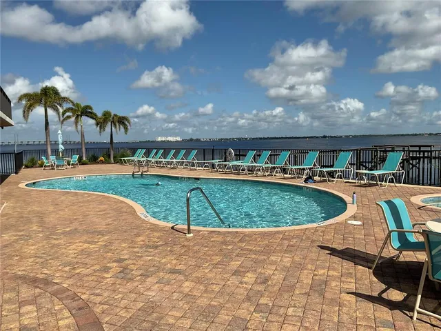 a view of a swimming pool and outdoor space