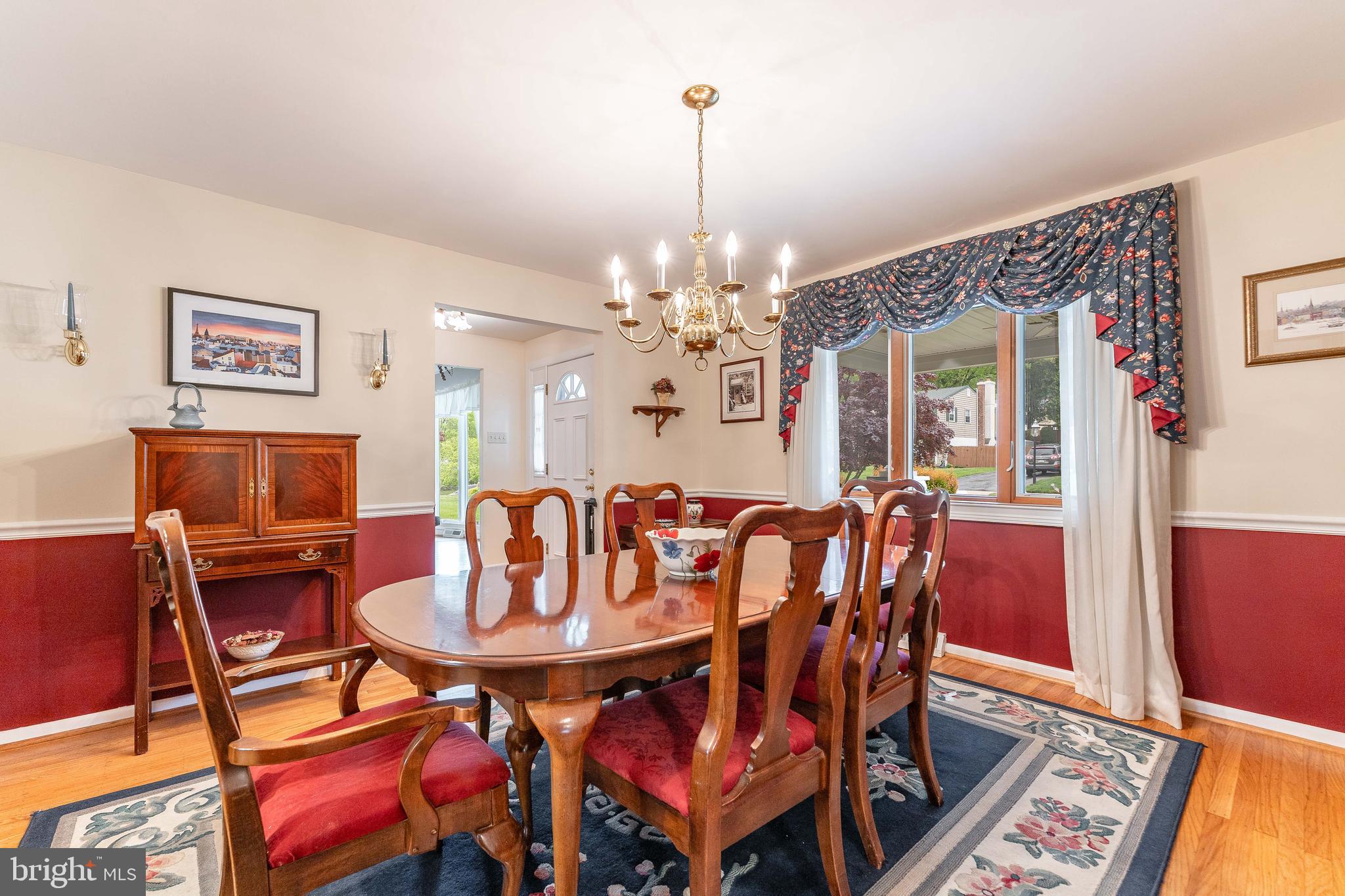 209 Beechtree Drive Broomall, PA 19008 - Photo 11 of 61 a view of a dining room with furniture and chandelier