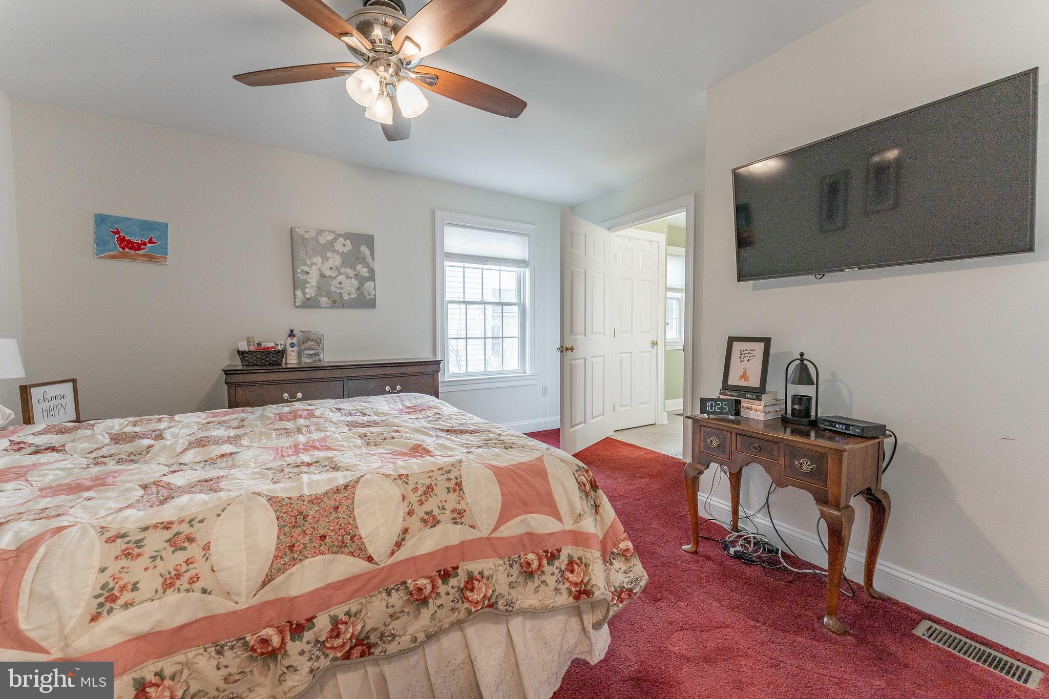 209 Beechtree Drive Broomall, PA 19008 - Photo 31 of 61 a bedroom with a bed and a flat screen tv