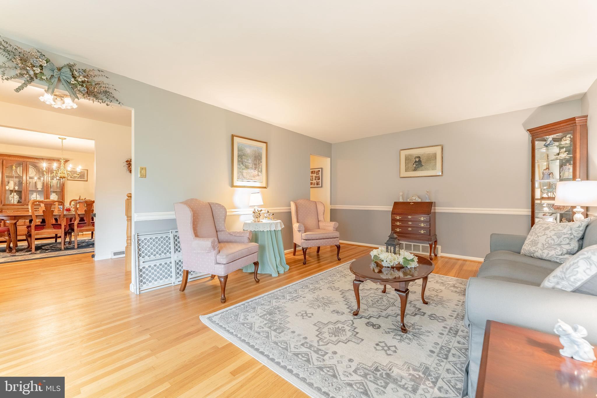 209 Beechtree Drive Broomall, PA 19008 - Photo 7 of 61 a living room with furniture and a table