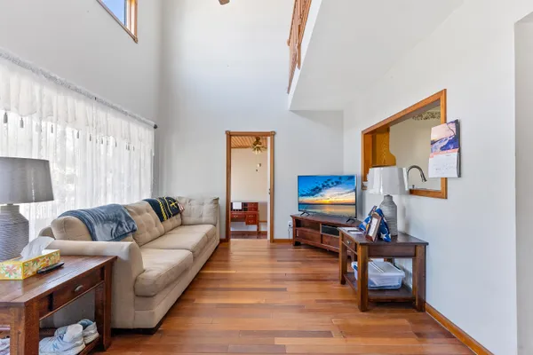 a living room with furniture and a couch