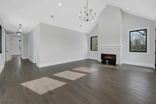 a view of livingroom with furniture and wooden floor