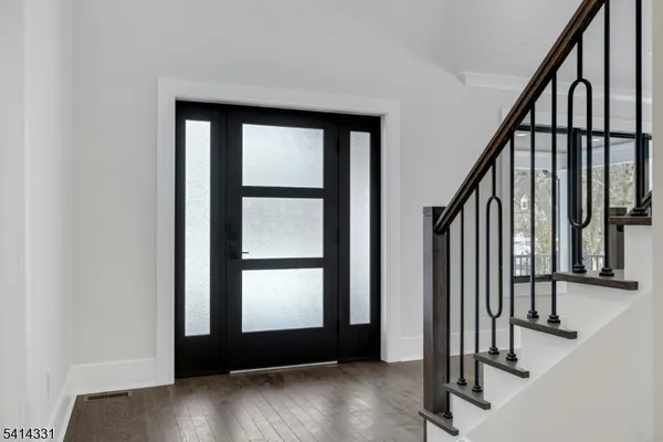 a view of an entryway with staircase