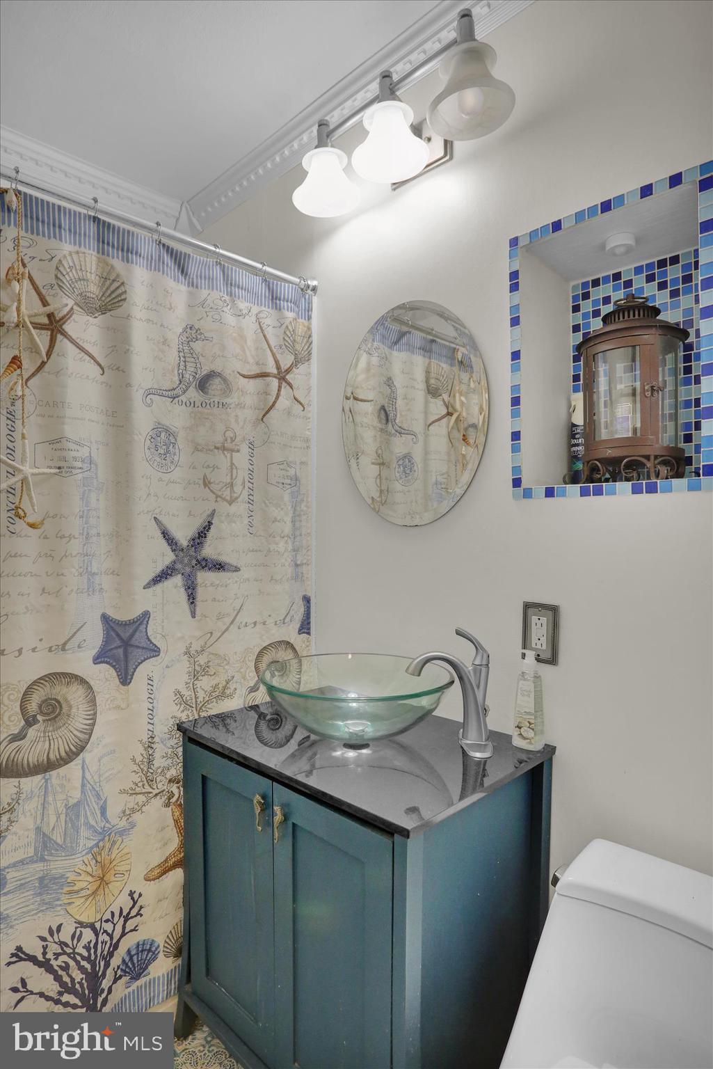 3 Cedarwood Road Reading, PA 19610 - Photo 19 of 34 a bathroom with a granite countertop sink a mirror and shower