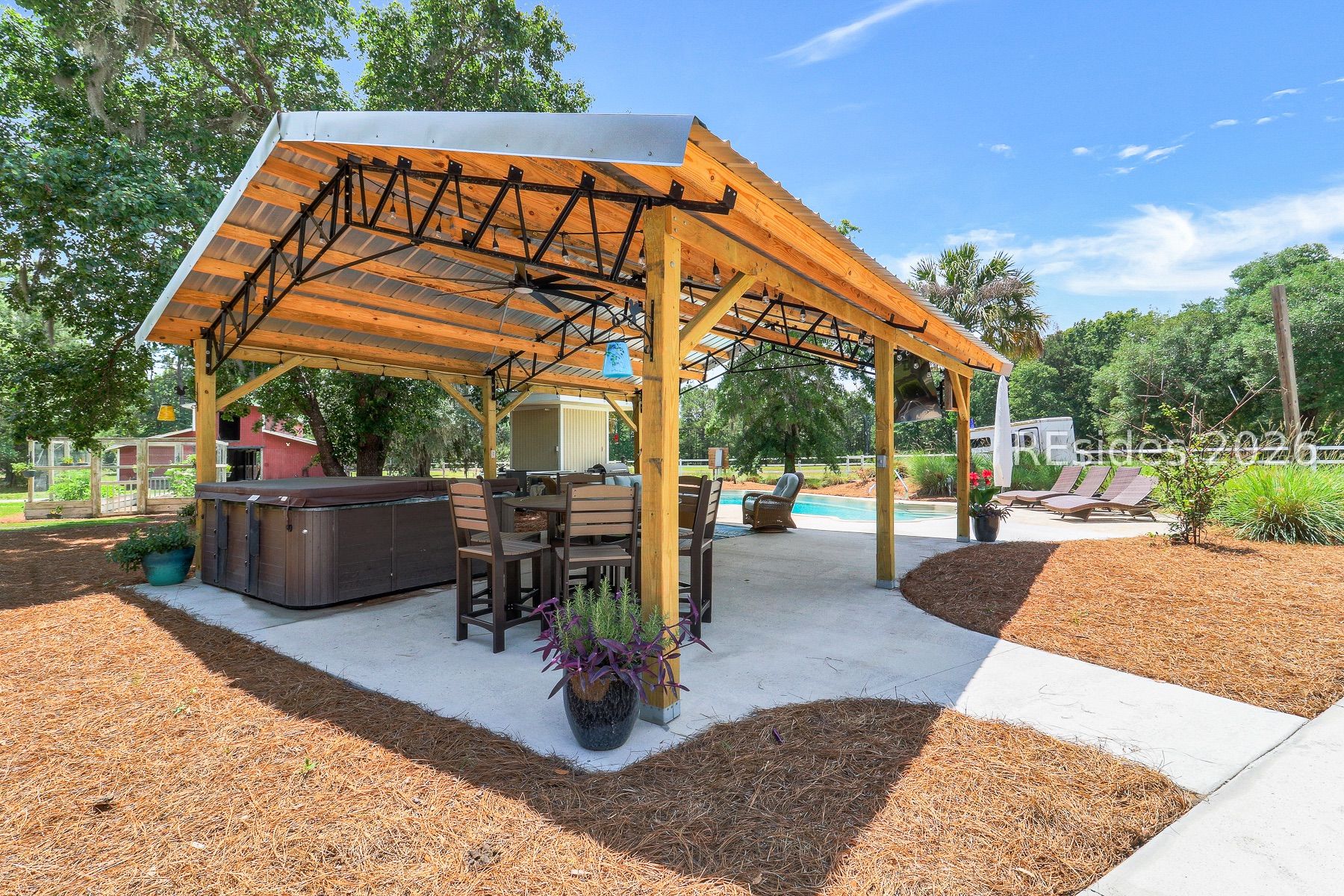 7724 Bees Creek Road Ridgeland, SC 29936 - Photo 58 of 82 New Covered Sitting area by pool with Tv/Firepit