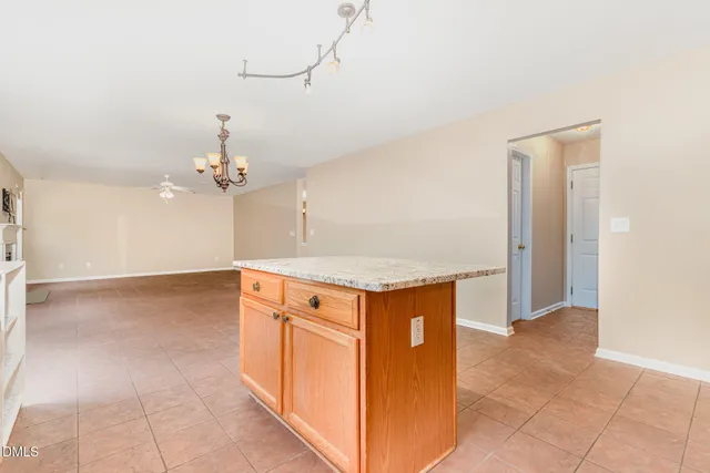 a view of kitchen and hallway