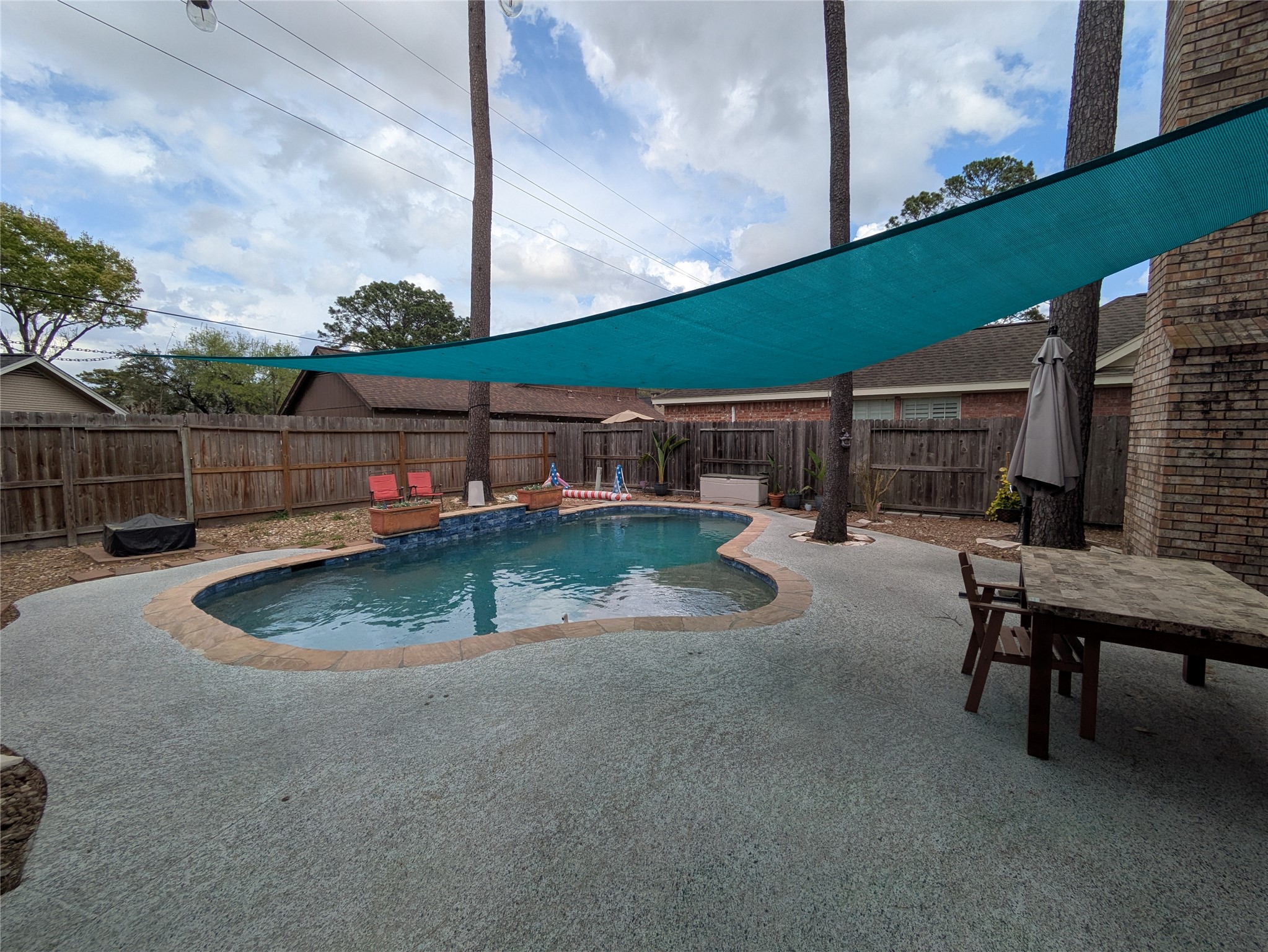 9222 Symphonic Lane Houston, TX 77040 - Photo 24 of 33 Backyard with recently resurfaced pool and deck