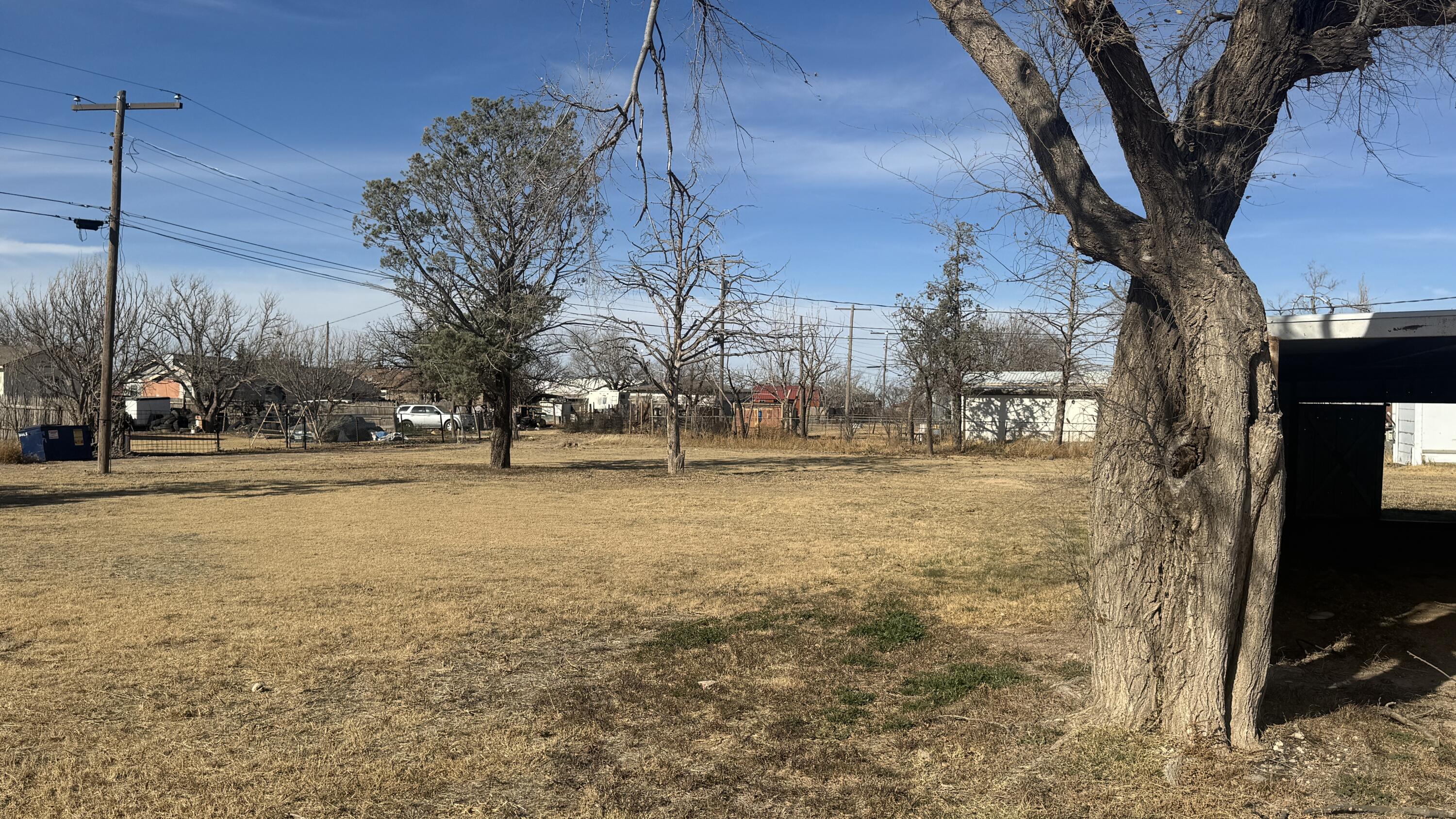311 11th Street Ralls, TX 79357 - Photo 18 of 21 a view of road with yard