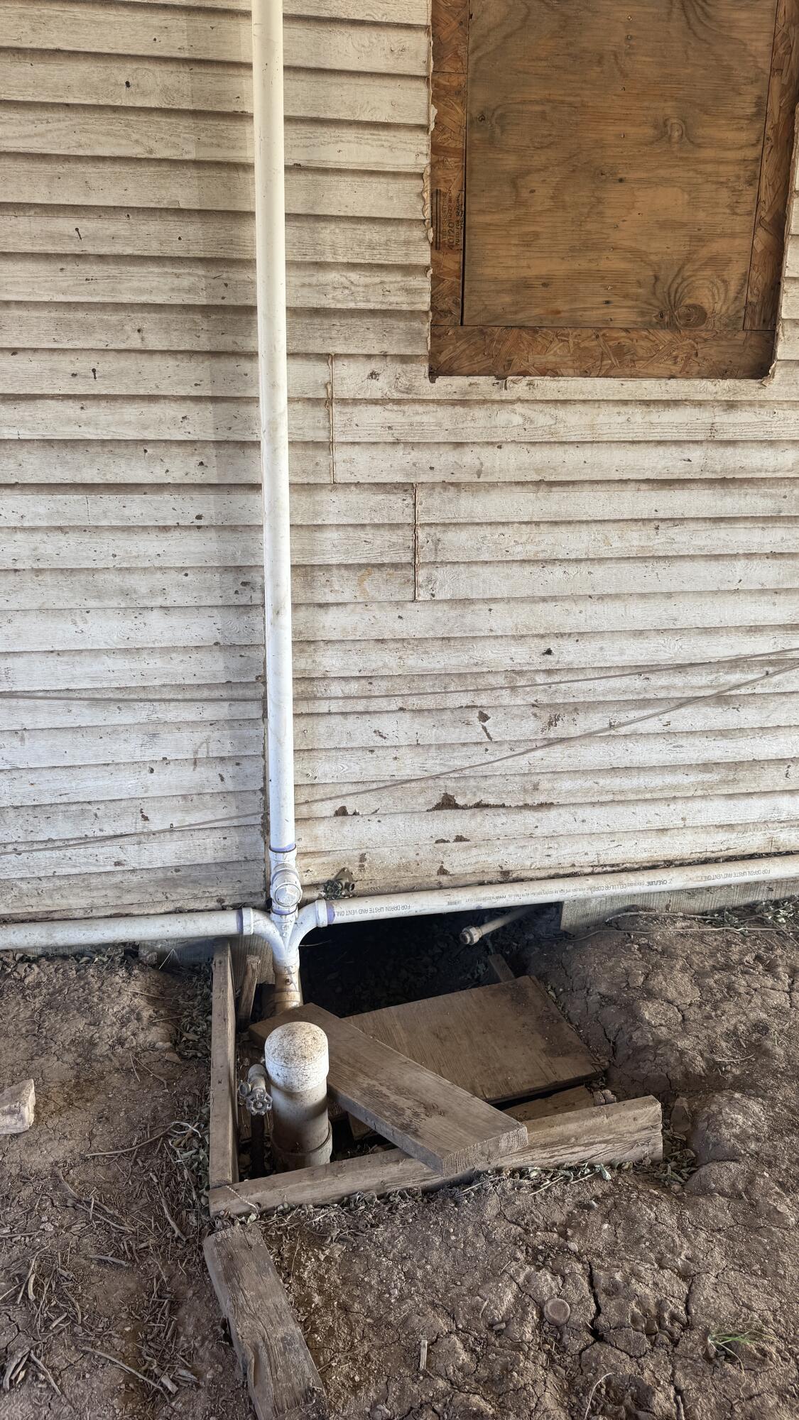 311 11th Street Ralls, TX 79357 - Photo 20 of 21 a bathroom with a sink and a bathtub