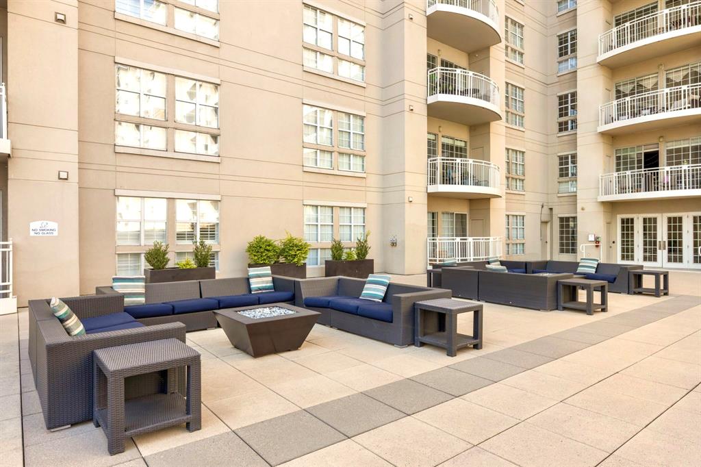 3225 Turtle Creek Boulevard, Unit 120 Dallas, TX 75219 - Photo 34 of 38 outdoor seating/pool area