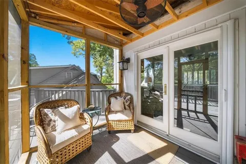 a view of a livingroom with workspace and a couch