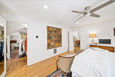 a view of living room with furniture and a rug