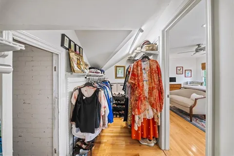 a bathroom with a sink a mirror and a window