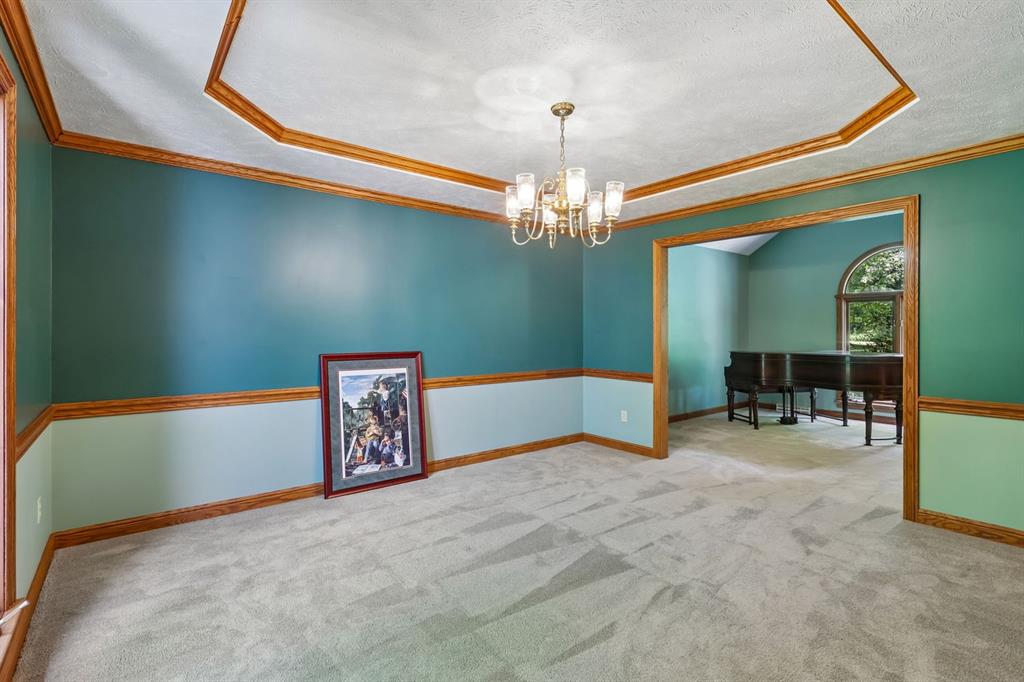 301 Romain Road Pulaski, PA 16143 - Photo 17 of 49 The dining room has a frayed ceiling with oak trim and chair rail