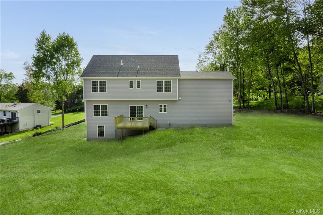 991 Freedom Road Pleasant Valley, NY 12569 - Photo 21 of 23 a view of a house with a yard