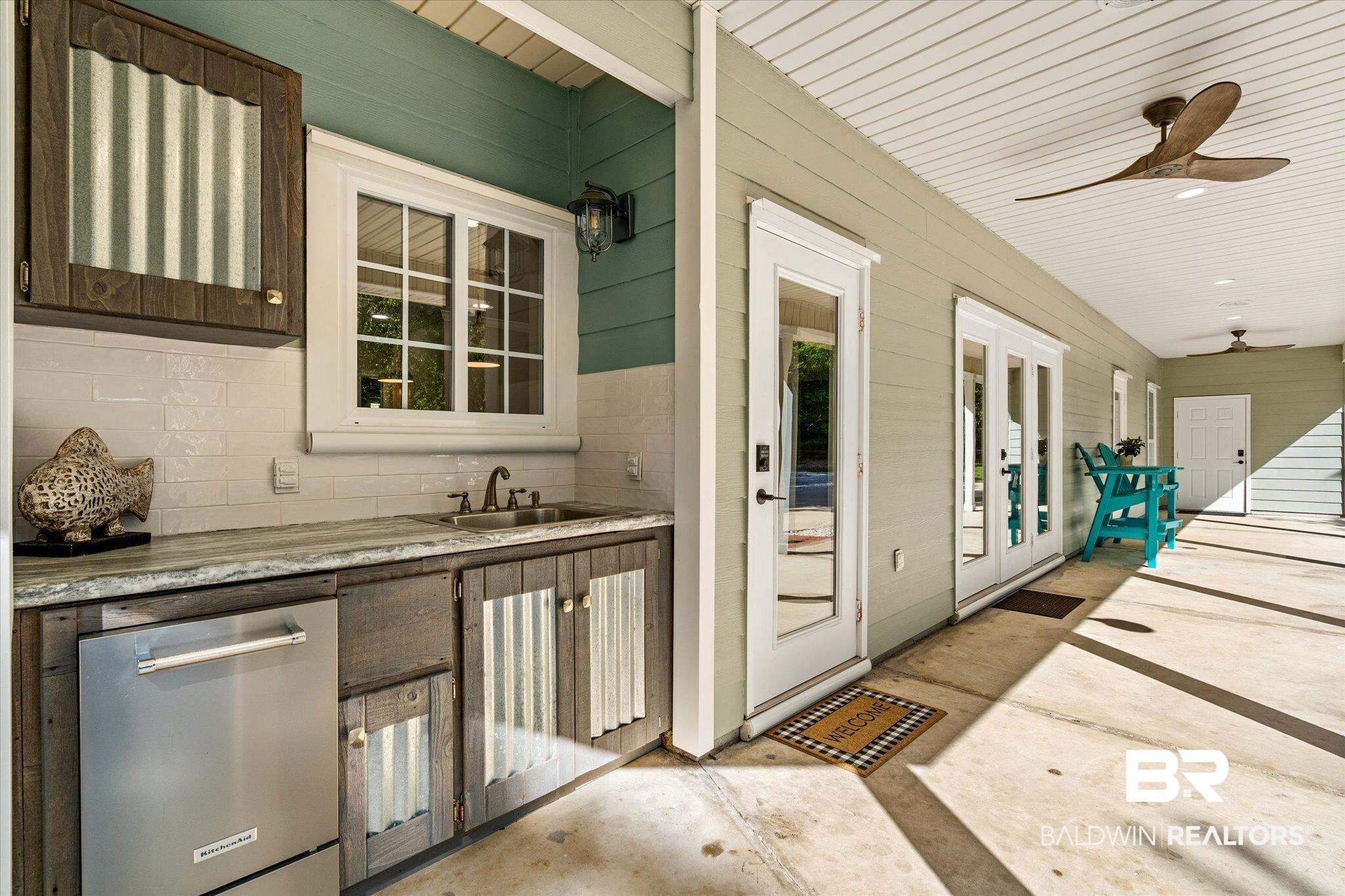 4947 Look Rook Road Orange Beach, AL 36561 - Photo 18 of 24 Exterior space featuring a sink, a ceiling fan, and area for grilling