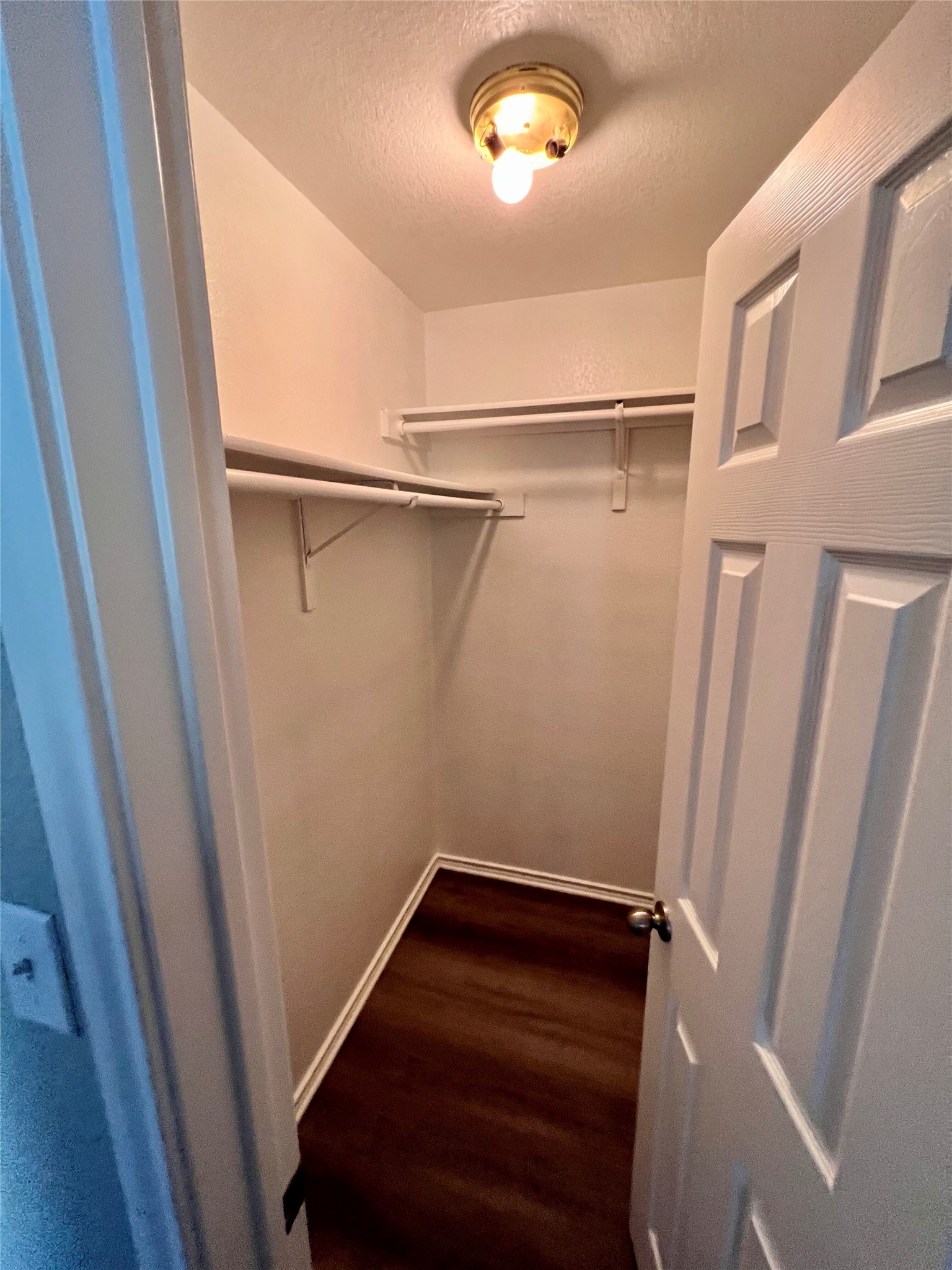 1801 Constantino Circle Austin, TX 78745 - Photo 17 of 22 a view of walk in closet with empty racks