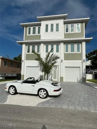 a view of a car parked in front of a building