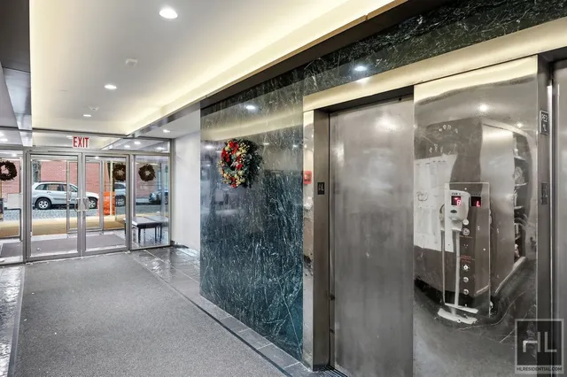 a view of a hallway with workspace