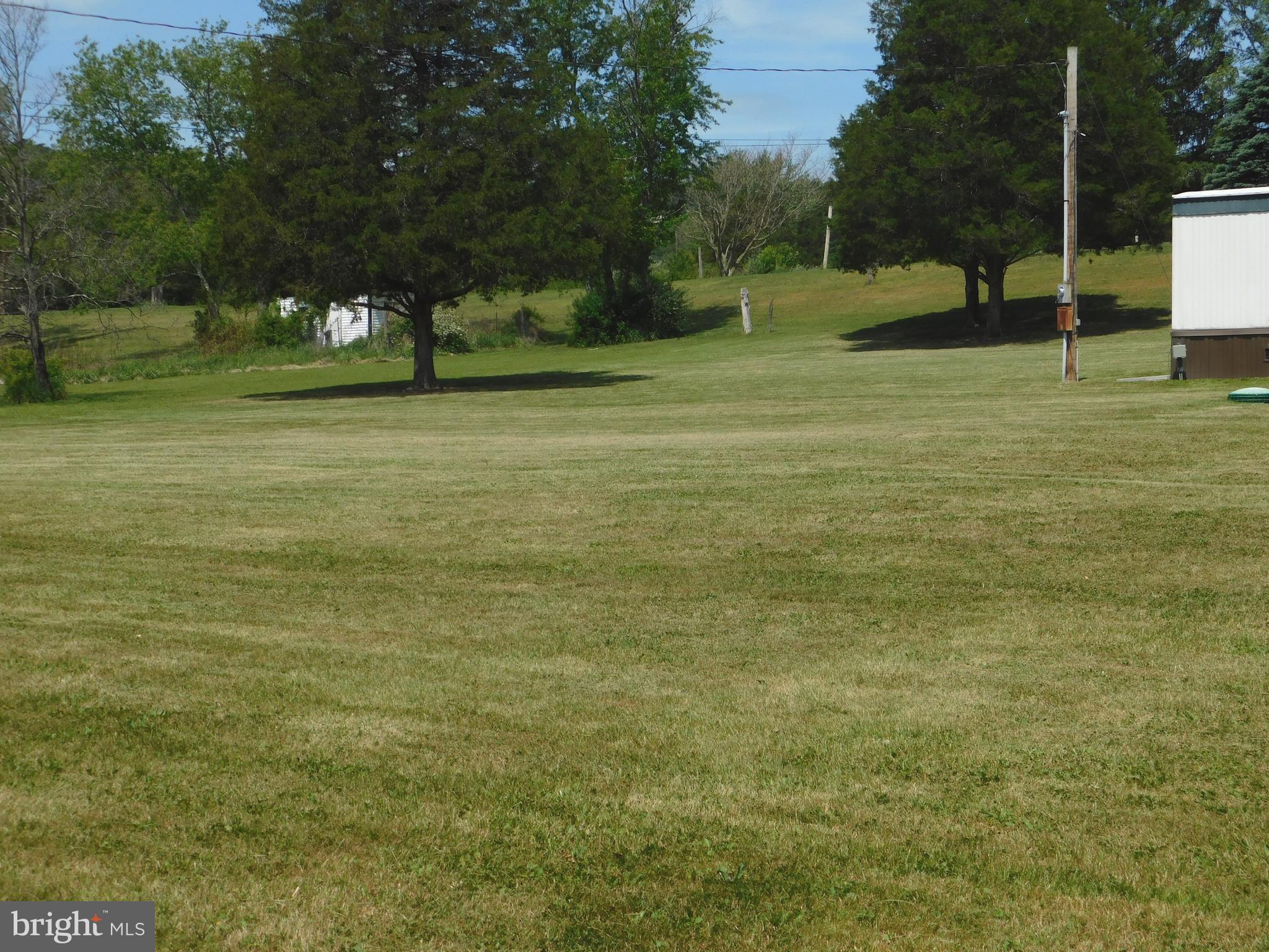 192 AA Rogers Road Augusta, WV 26704 - Photo 4 of 34 a view of a field with trees