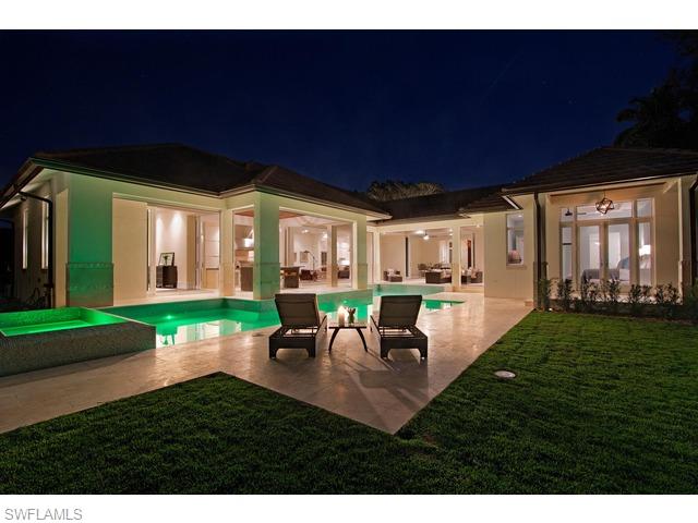 2255 Crayton Road Naples, FL 34103 - Photo 3 of 21 a view of swimming pool with outdoor seating