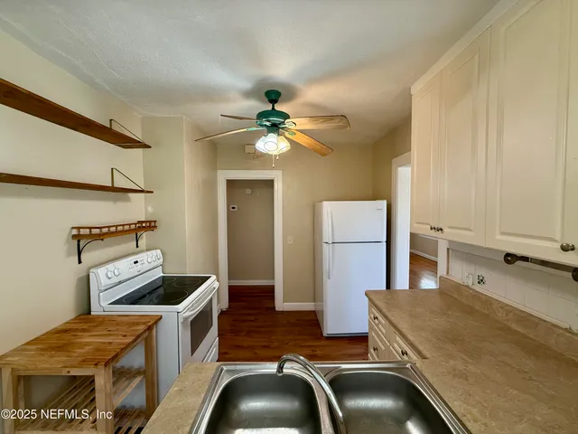 a room with furniture and a chandelier