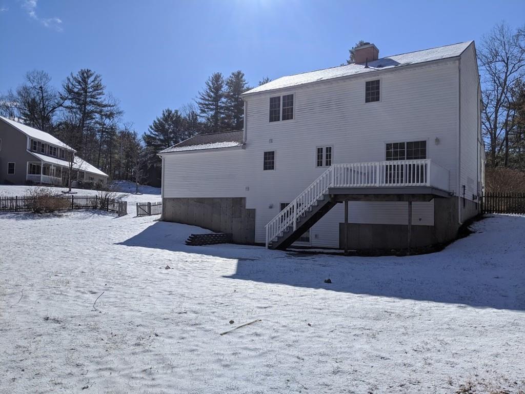 95 Babcock Tavern Road Ware, MA 01082 - Photo 4 of 31 a view of a house with a snow in the yard
