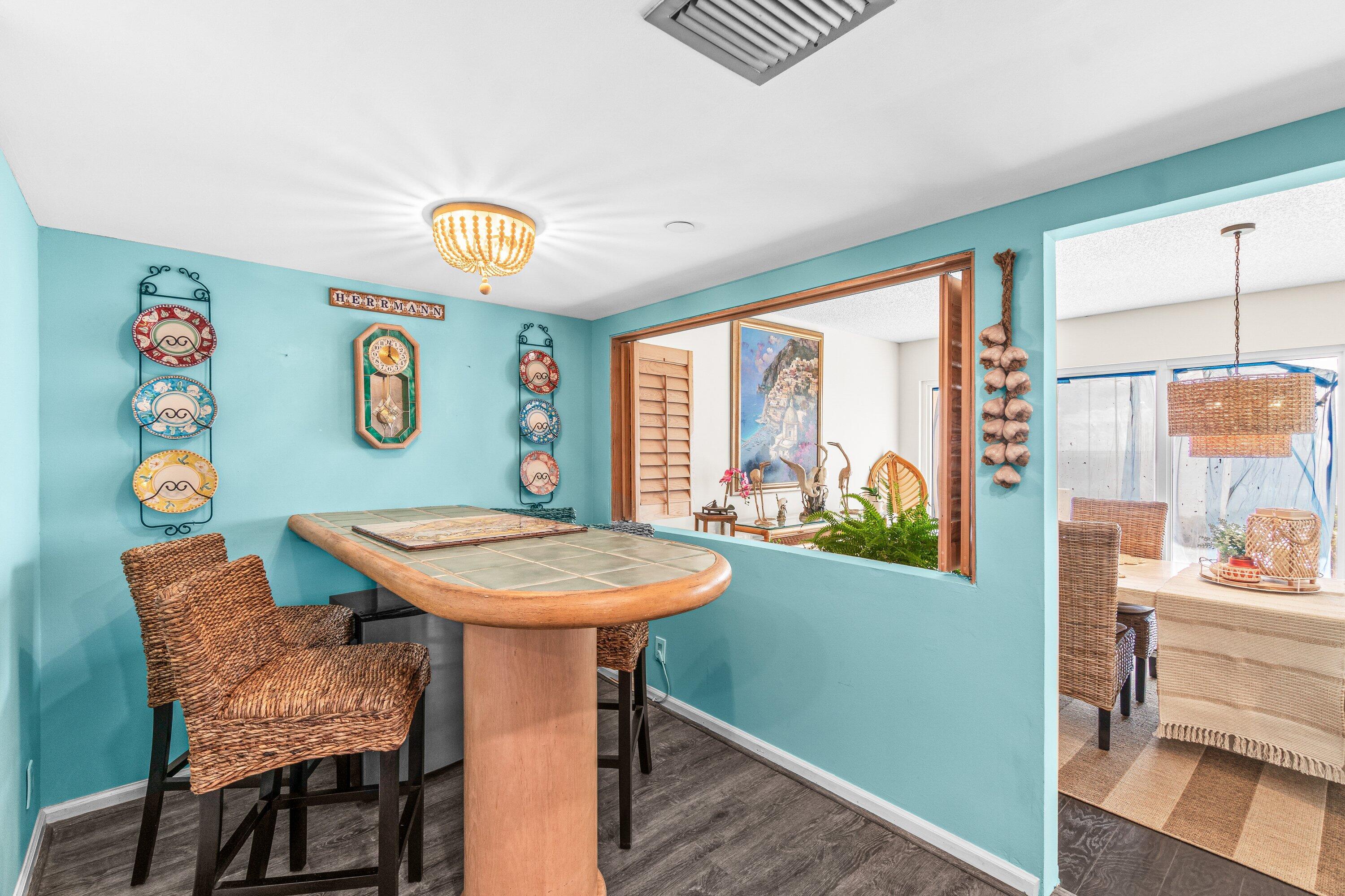 4301 North Ocean Boulevard, Unit 708 Boca Raton, FL 33431 - Photo 16 of 51 a view of a dining room with furniture window and outside view