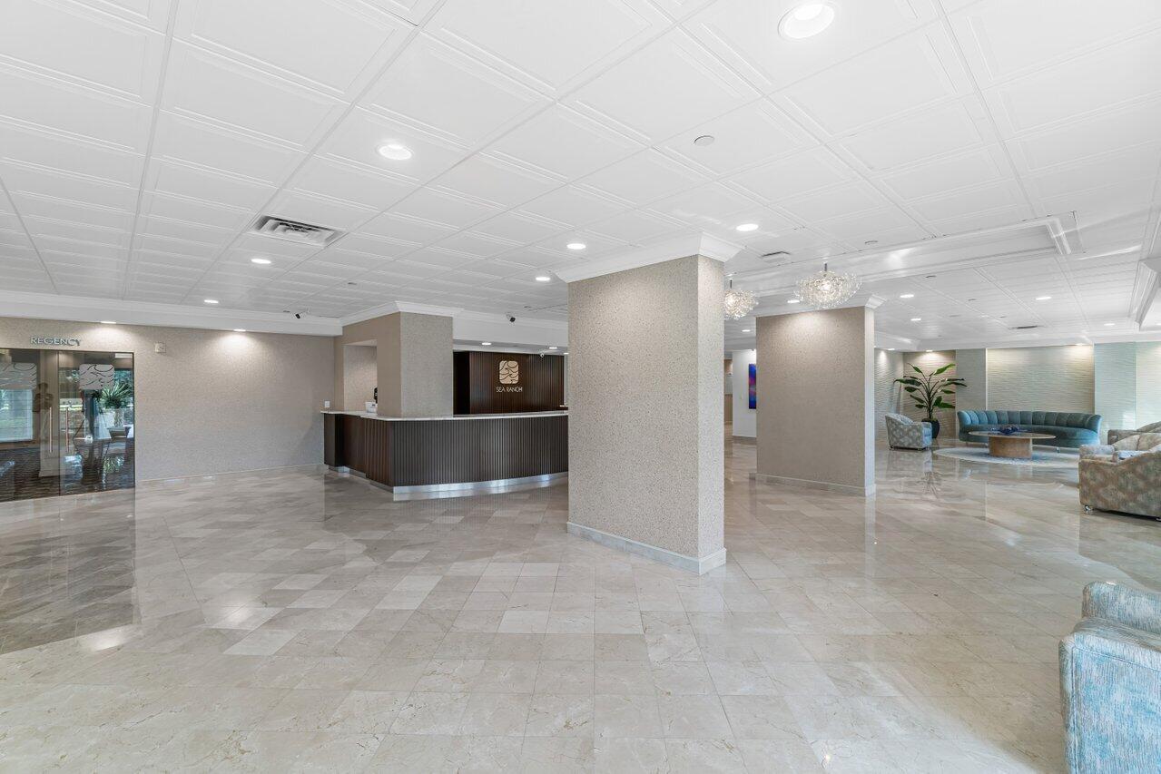 4301 North Ocean Boulevard, Unit 708 Boca Raton, FL 33431 - Photo 2 of 51 a view of a hallway with kitchen