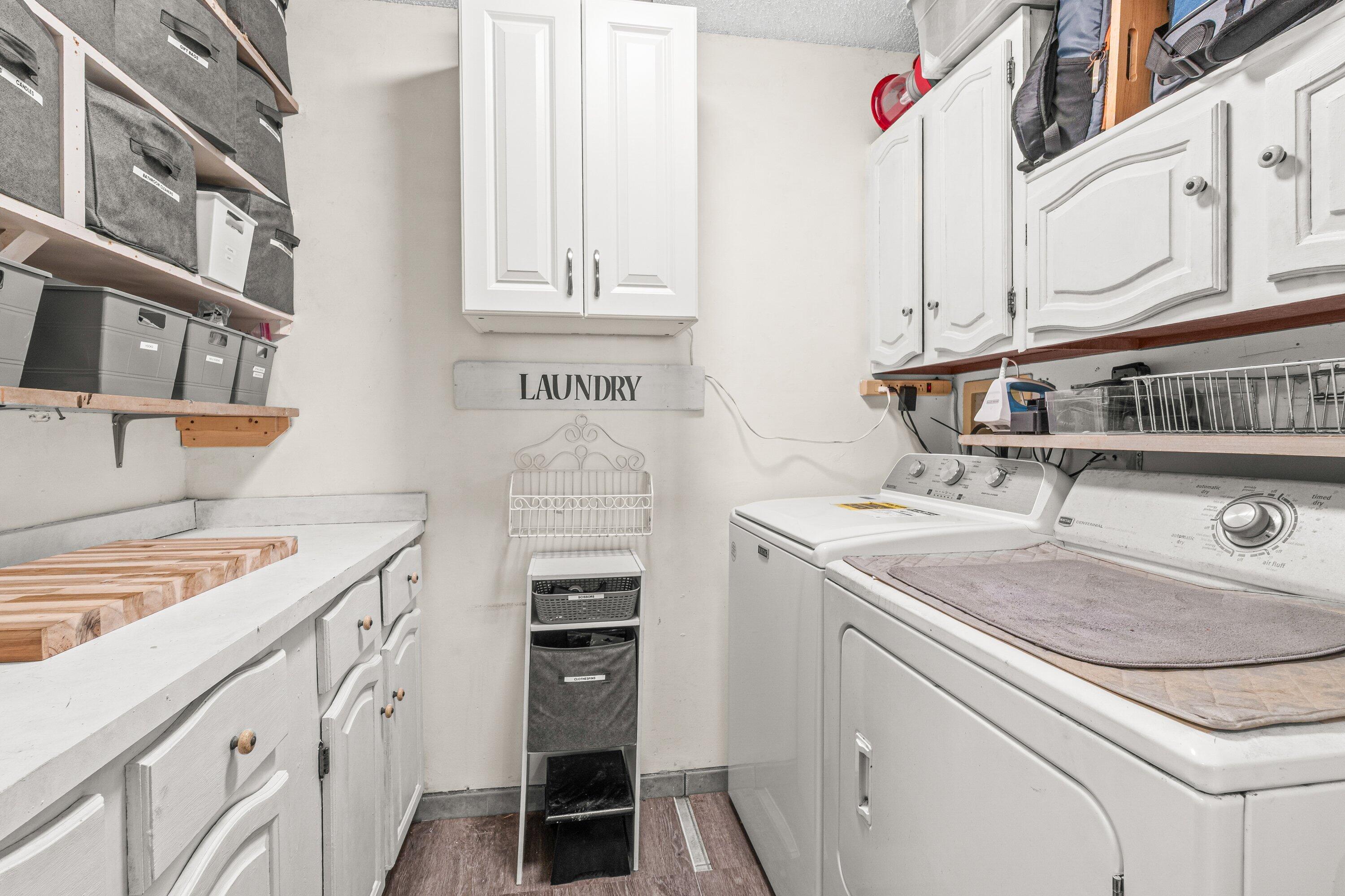 4301 North Ocean Boulevard, Unit 708 Boca Raton, FL 33431 - Photo 22 of 51 a kitchen with a sink stove and cabinets