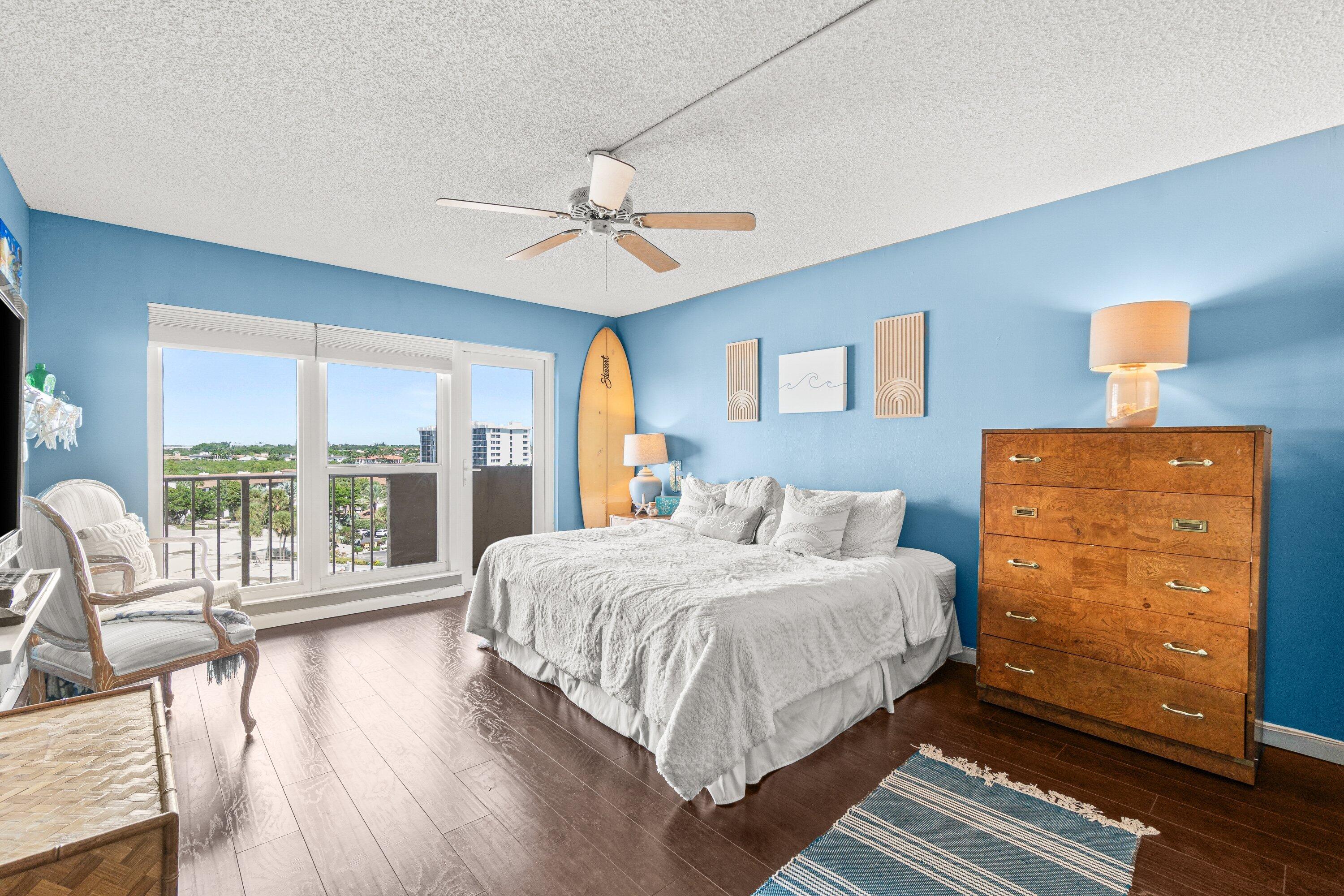 4301 North Ocean Boulevard, Unit 708 Boca Raton, FL 33431 - Photo 23 of 51 a bedroom with a large bed and a large window