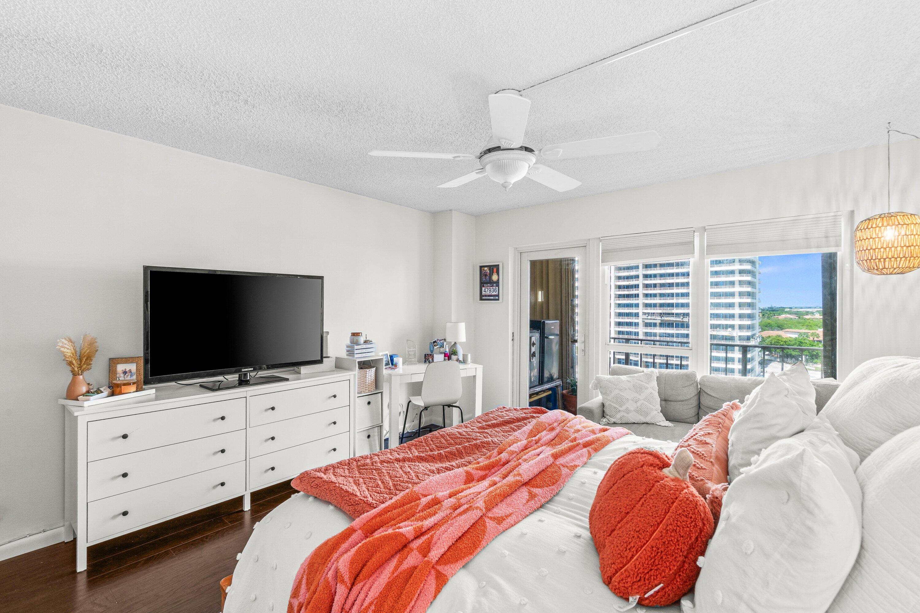 4301 North Ocean Boulevard, Unit 708 Boca Raton, FL 33431 - Photo 34 of 51 a bedroom with a bed and a flat screen tv