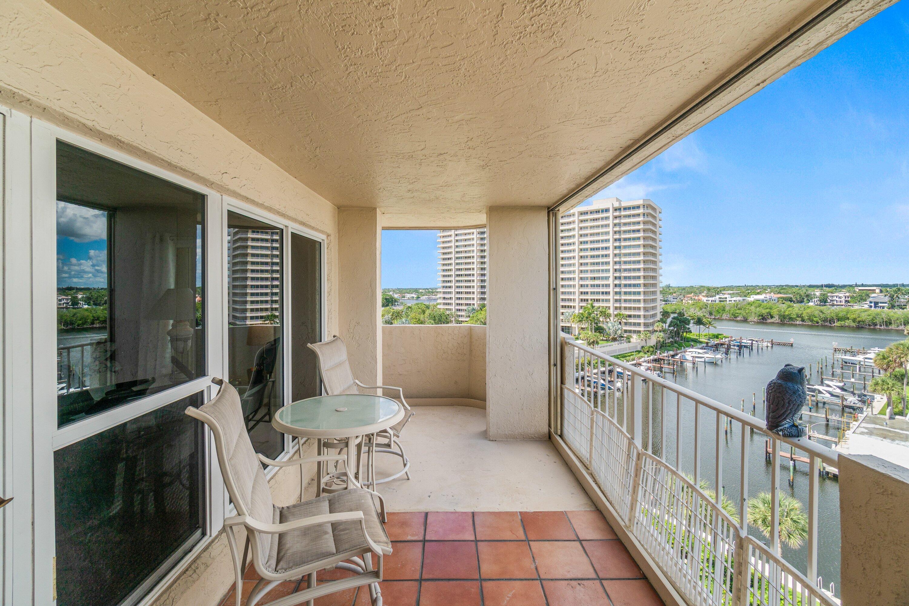 4301 North Ocean Boulevard, Unit 708 Boca Raton, FL 33431 - Photo 36 of 51 a view of a balcony with chair and a table