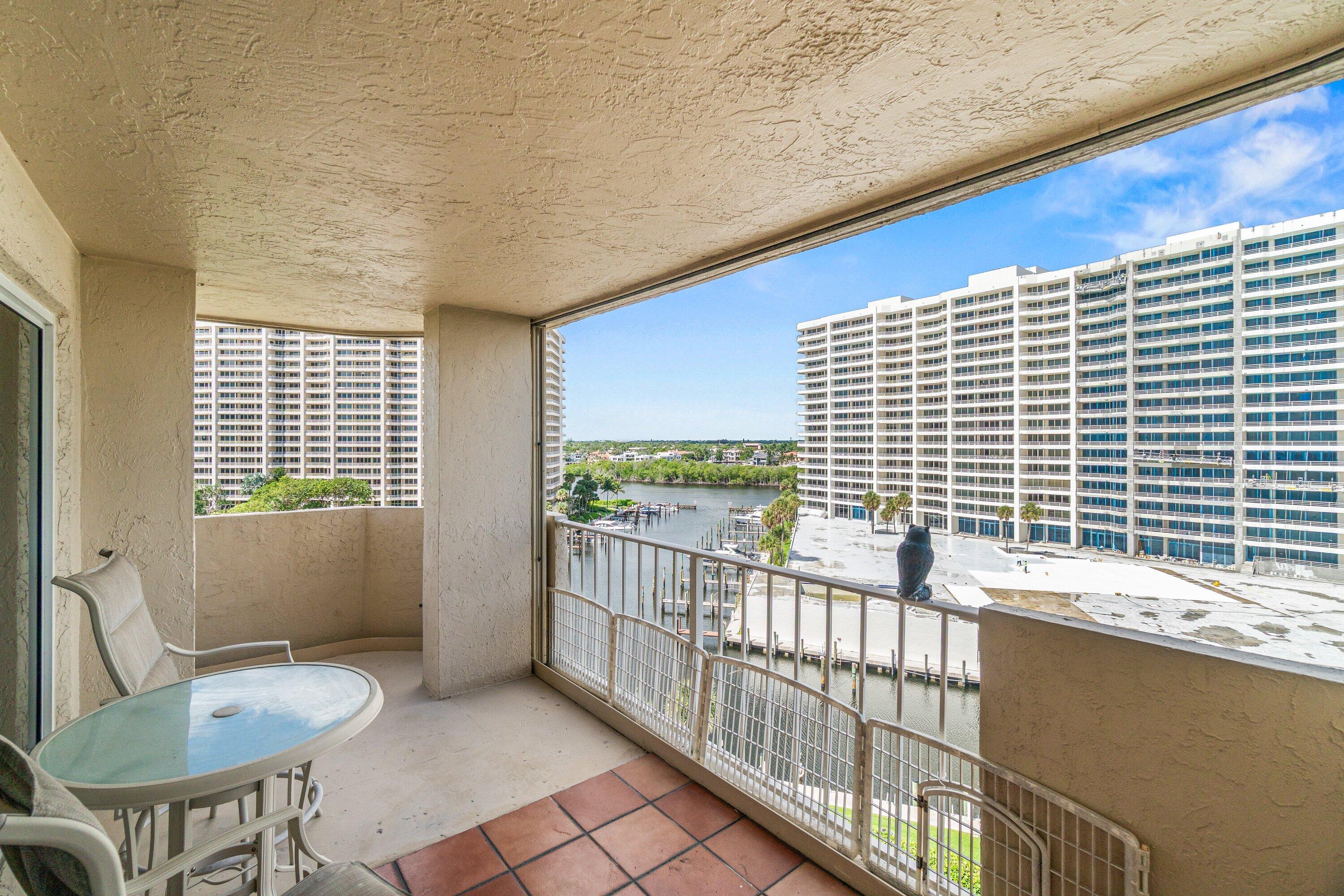4301 North Ocean Boulevard, Unit 708 Boca Raton, FL 33431 - Photo 37 of 51 a view of a balcony with chairs