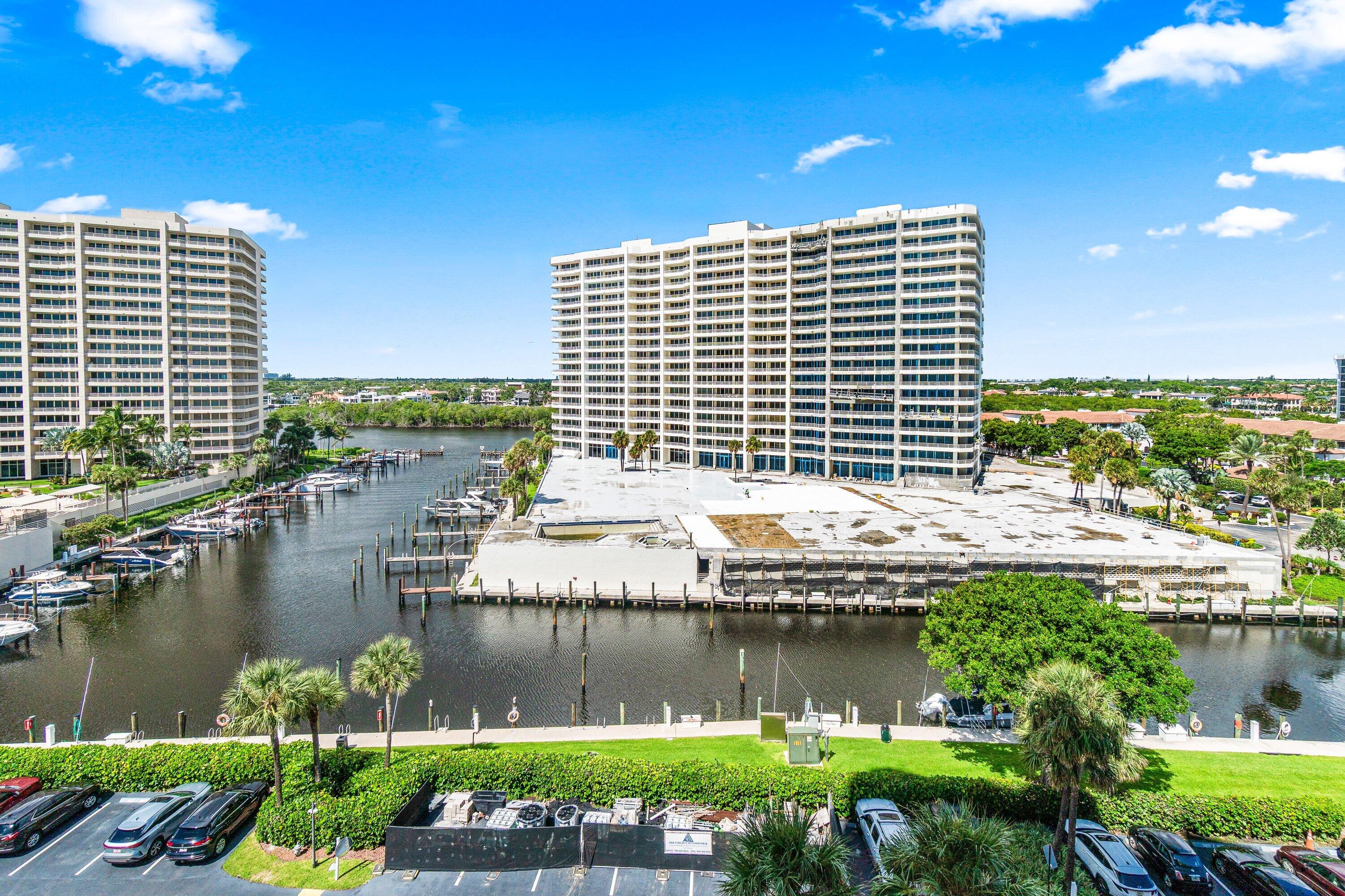 4301 North Ocean Boulevard, Unit 708 Boca Raton, FL 33431 - Photo 42 of 51 a view of a lake with a city skyline in the background
