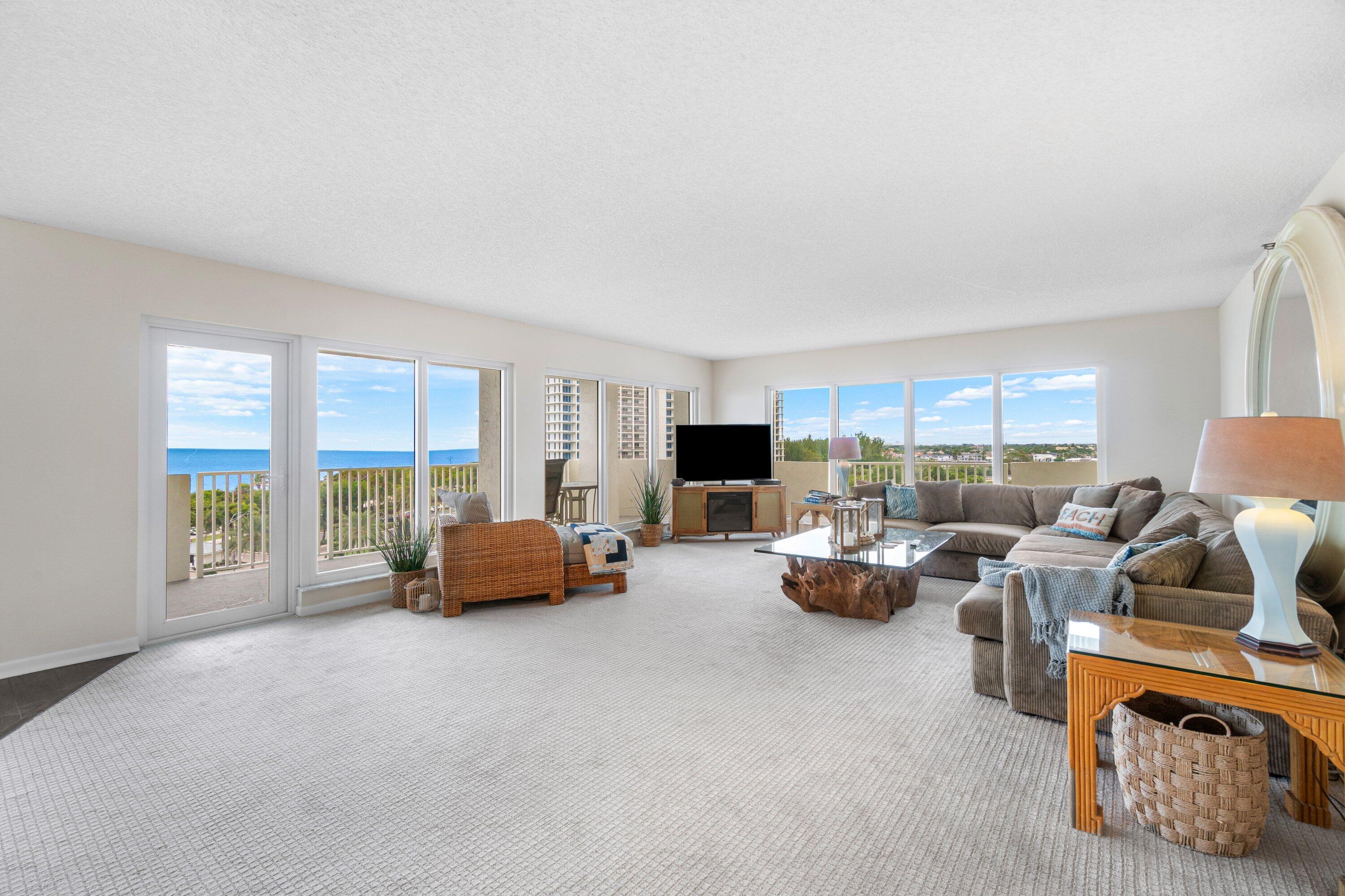 4301 North Ocean Boulevard, Unit 708 Boca Raton, FL 33431 - Photo 5 of 51 a living room with furniture and a large window