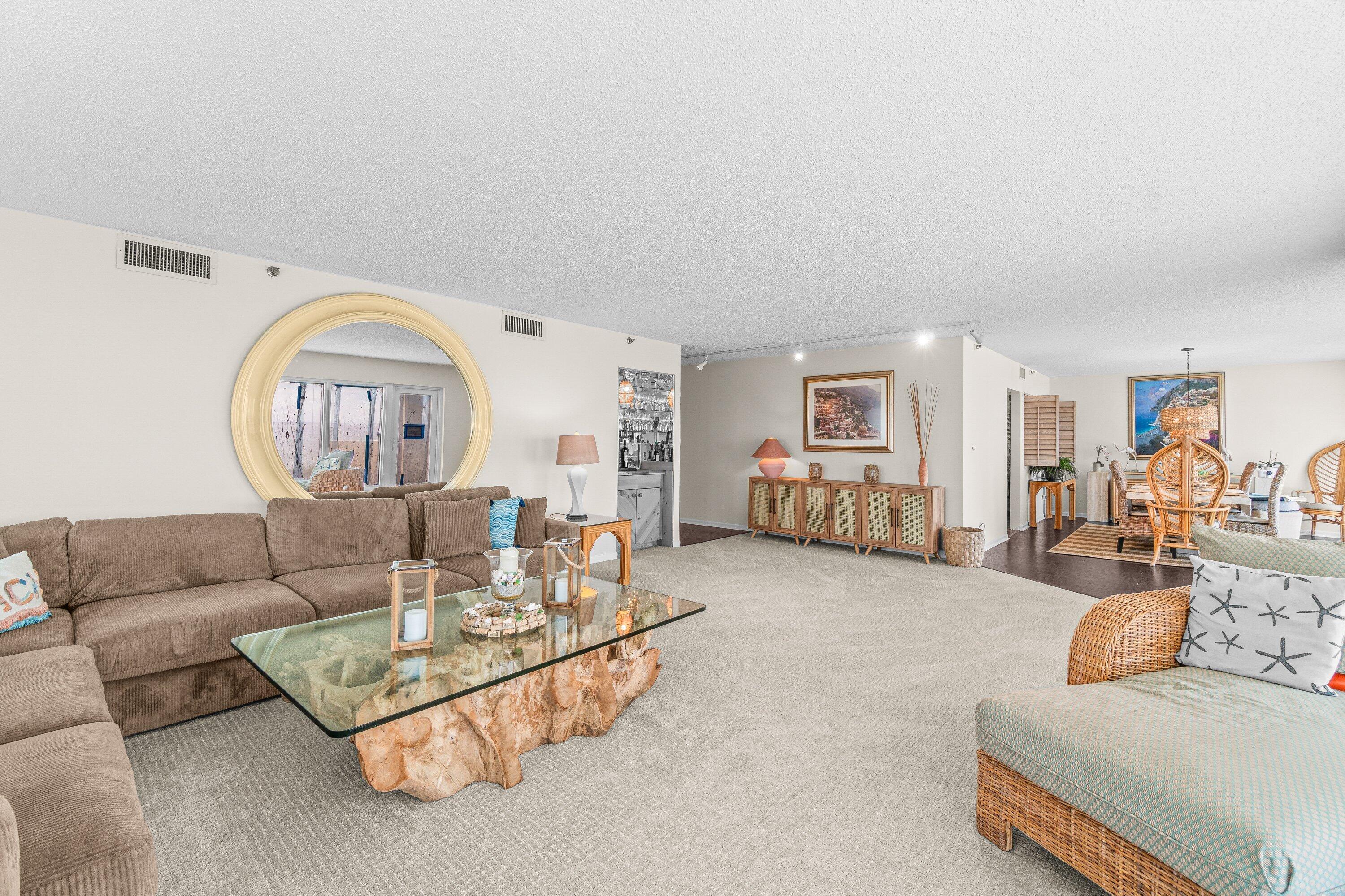 4301 North Ocean Boulevard, Unit 708 Boca Raton, FL 33431 - Photo 7 of 51 a living room with furniture and a large window