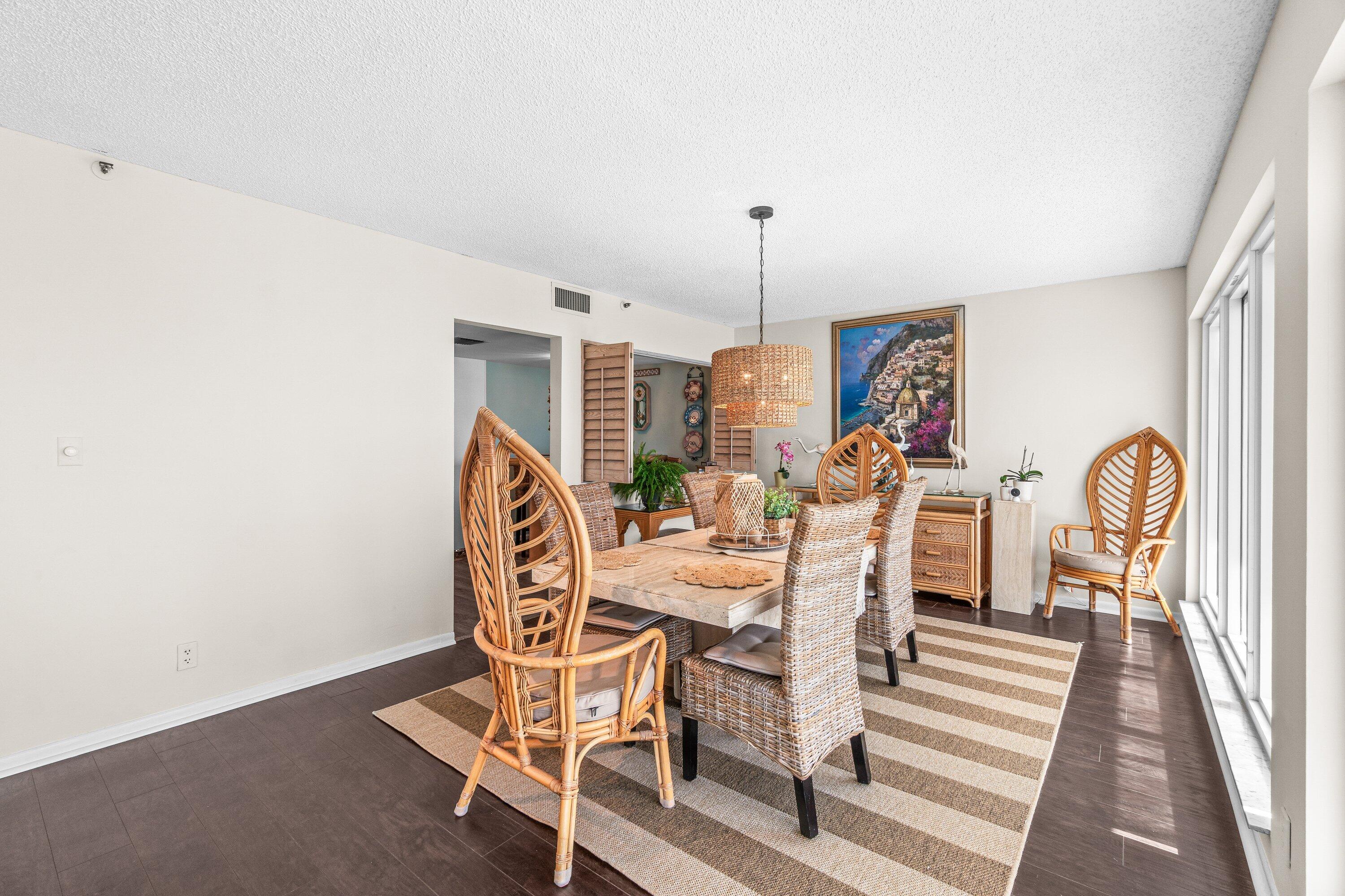 4301 North Ocean Boulevard, Unit 708 Boca Raton, FL 33431 - Photo 8 of 51 a view of a dining room with furniture and a window