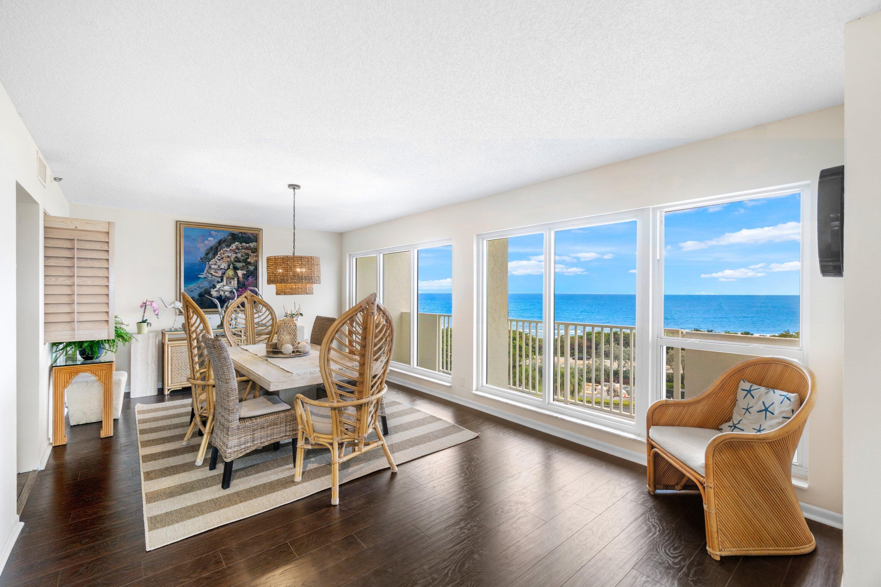 4301 North Ocean Boulevard, Unit 708 Boca Raton, FL 33431 - Photo 10 of 51 a dining room with furniture and wooden floor