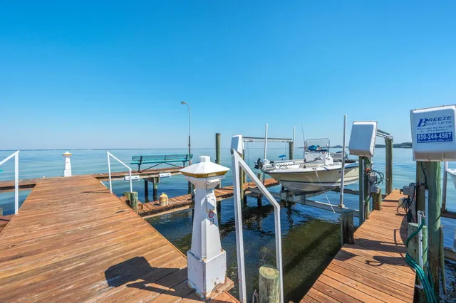 a view of a lake from a chairs