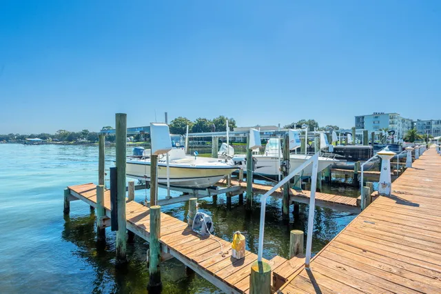 a view of a balcony with chairs
