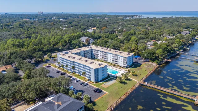 a aerial view of a house with a swimming pool