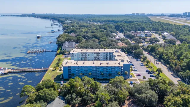 a house with swimming pool and porch
