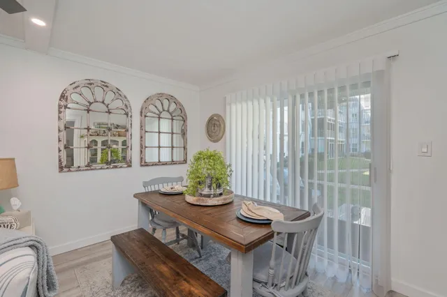 a view of a workspace with furniture