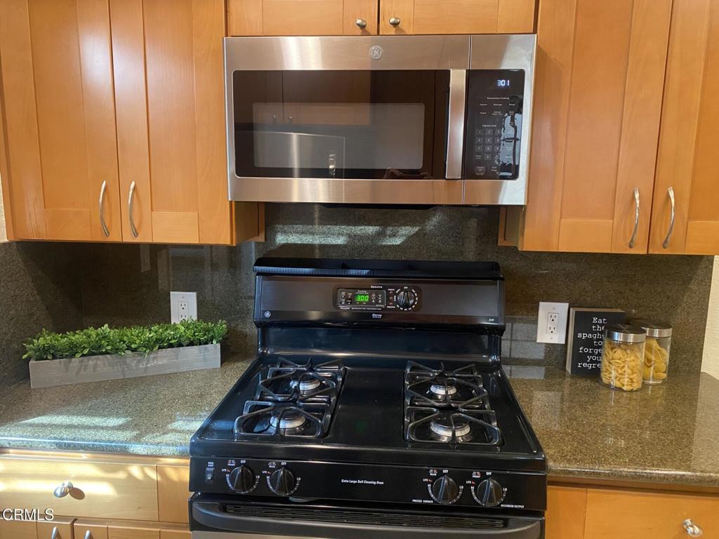 832 Magnolia Avenue, Unit 2 Pasadena, CA 91106 - Photo 11 of 20 a stove top oven sitting inside of a kitchen