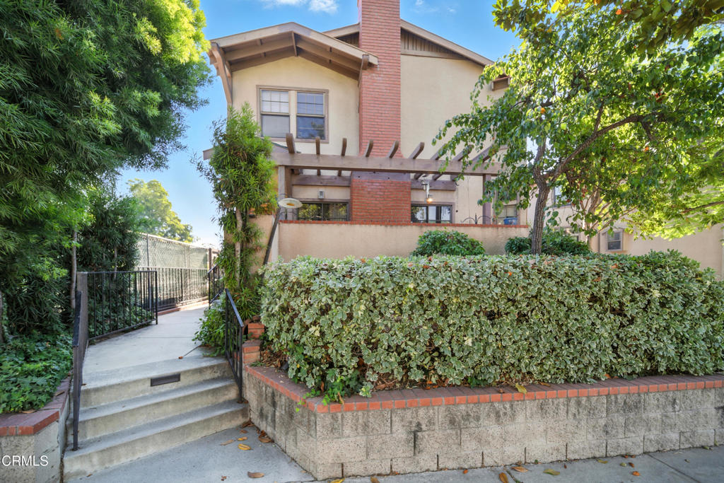 832 Magnolia Avenue, Unit 2 Pasadena, CA 91106 - Photo 19 of 20 a view of a house with a yard and potted plants